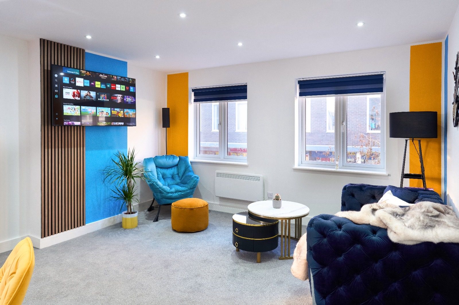 Living room with wall-mounted smart TV